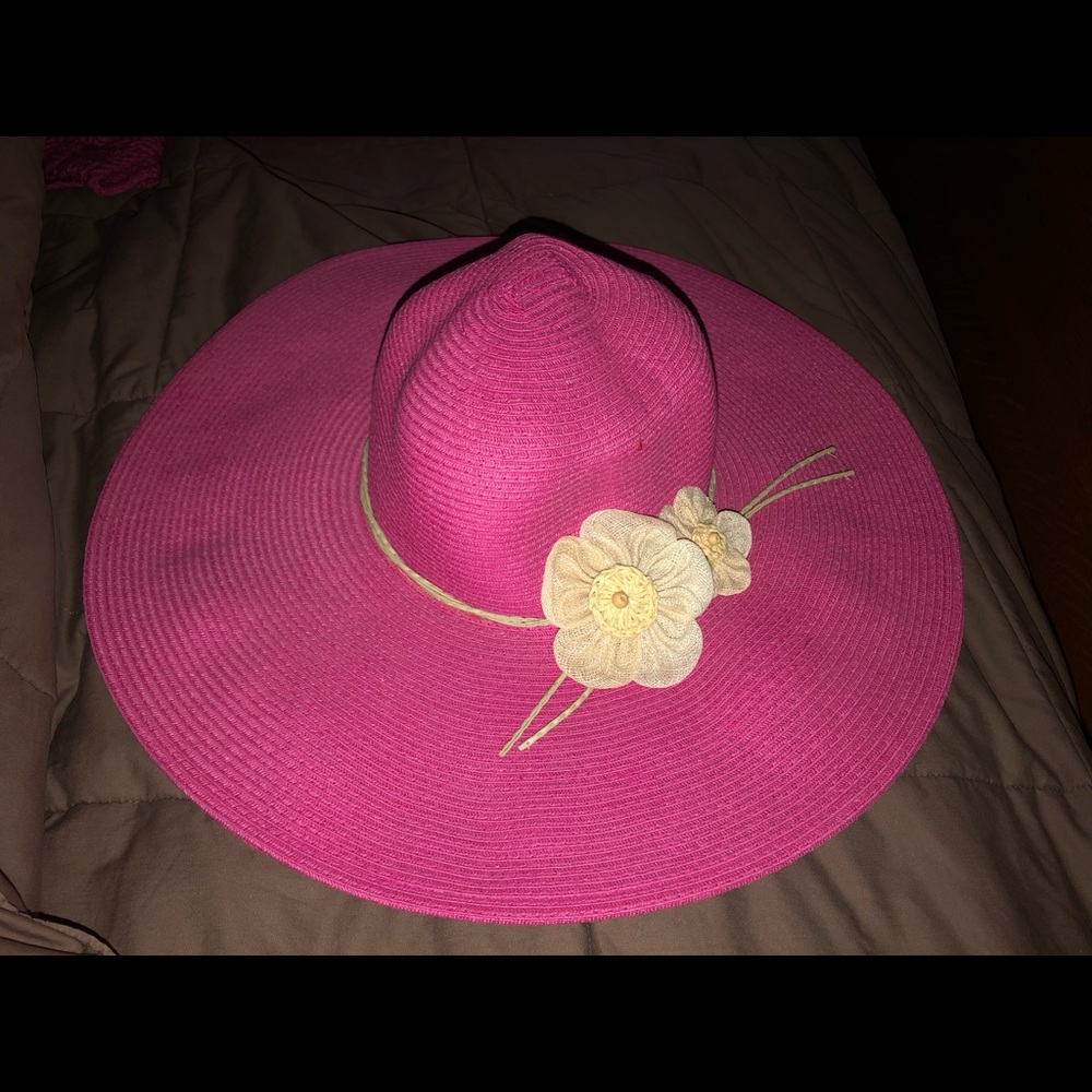 Pink with brown/tan flowers. Pretty much brand new w/o tags. One size fits most